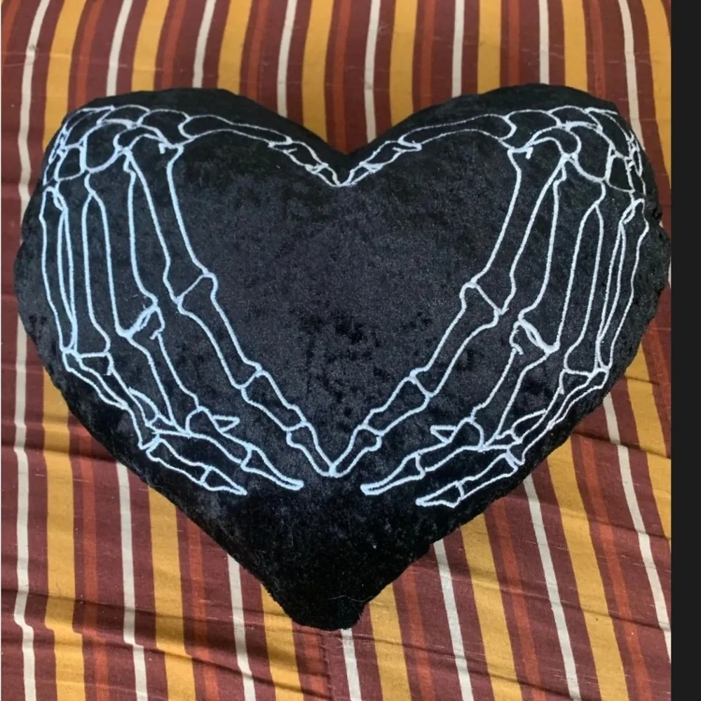 Black Heart Pillow with Skeleton Design